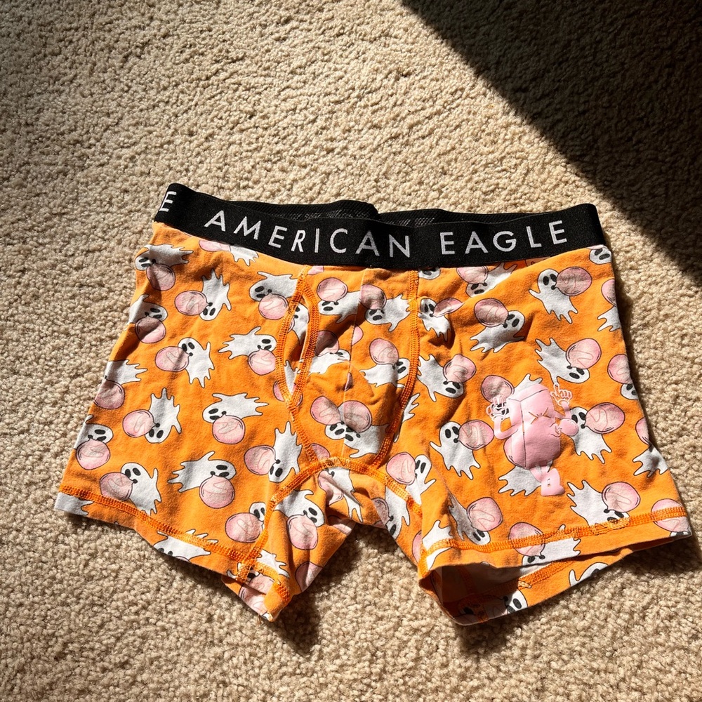 Briefs, Orange with ghosts blowing bubble gum. size medium